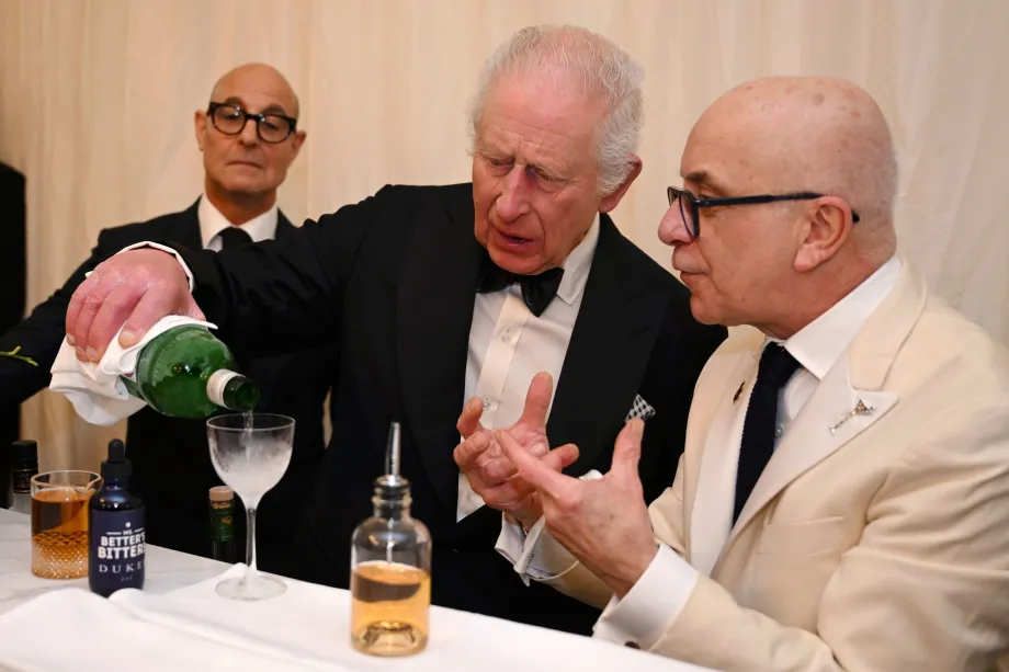 The King mixes a Martini