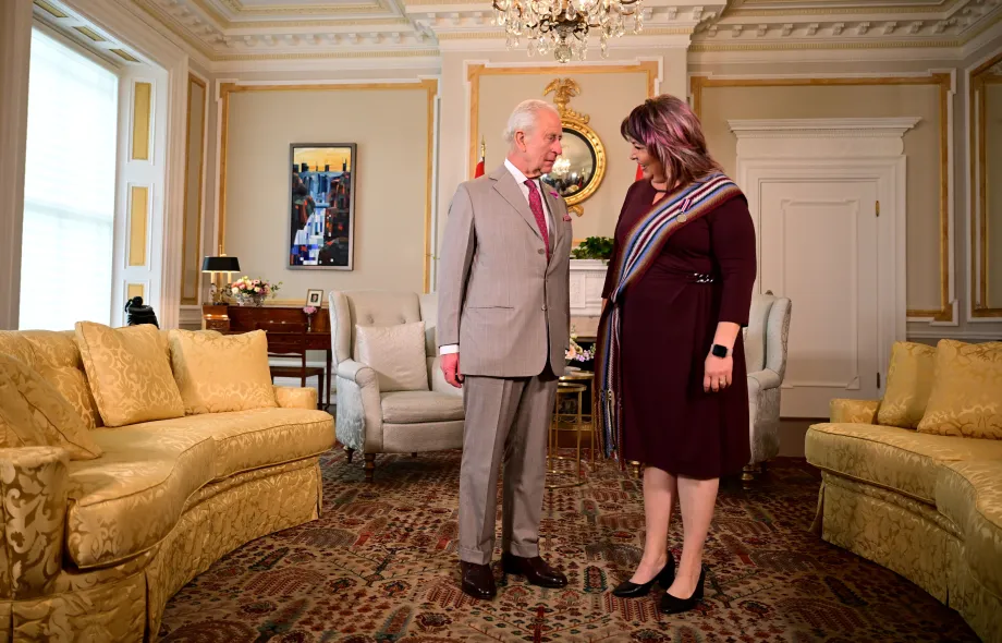 The King with Metis National Council President Victoria Pruden