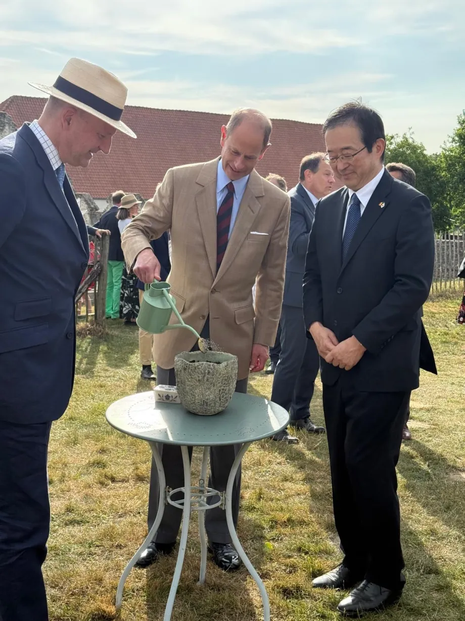 The Duke of Edinburgh plants a 'Tree of Peace' seed