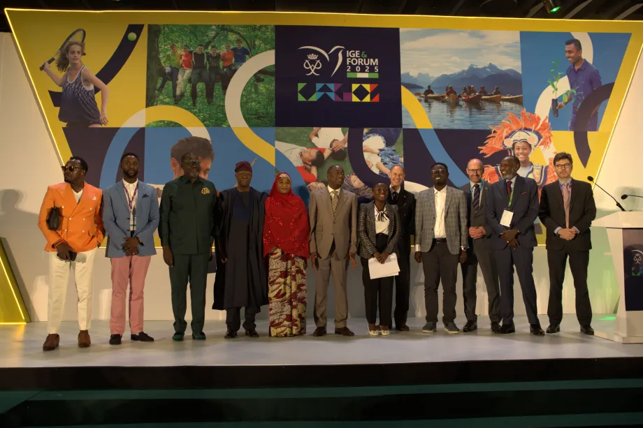 The Duke smiles with a group of people at the Forum opening ceremony