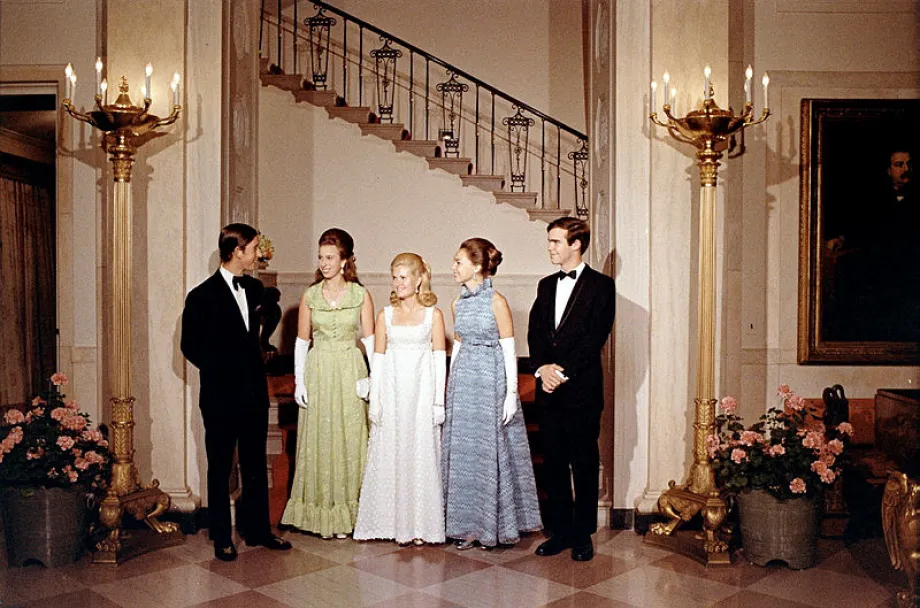21yr old Prince Charles and 19yr old Princess Anne speak with Tricia Nixon and Julie Nixon Eisenhower, and her husband David Eis.jpg