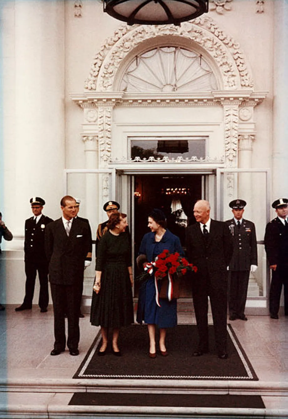 President Dwight D. Eisenhower, the First Lady, Queen Elizabeth II, and Prince Philip stand at the North Portico of the White House in 1957.