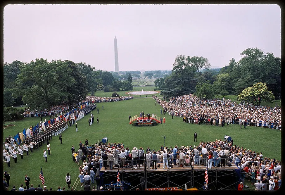 President George H. W. Bush and Queen Elizabeth II during an Arrival Ceremony at the White House, 1991. White House Historical A.jpg
