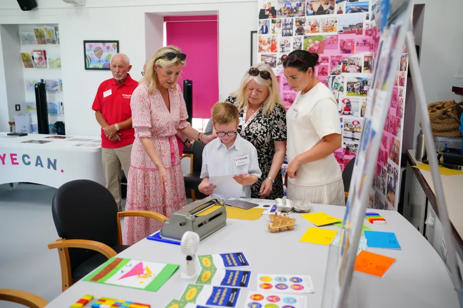 The Duchess of Edinburgh talks to families during a visit to EYECAN