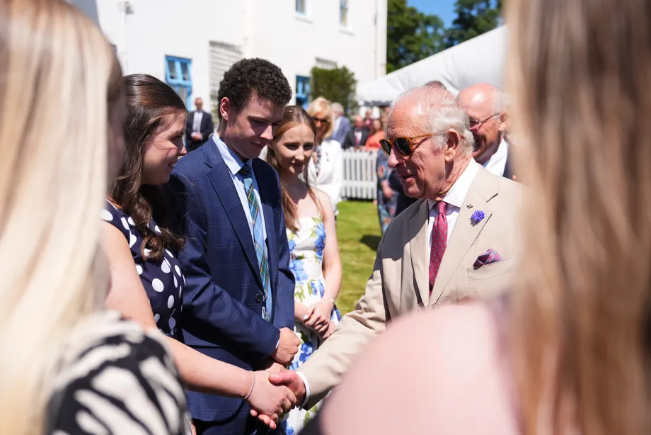 The King meets guests at a Garden Party