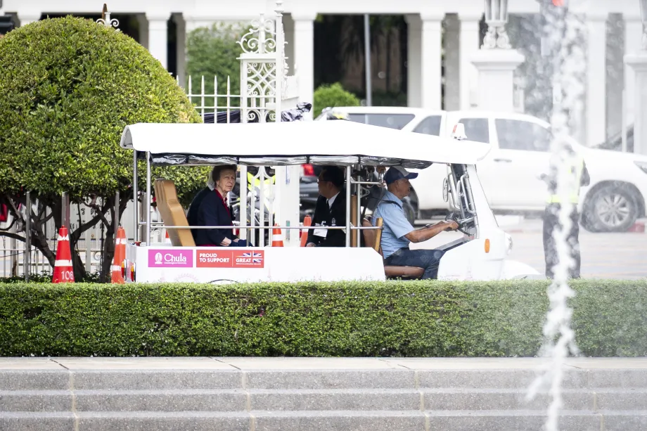 The Princess Royal rides in an electric tuk-tuk