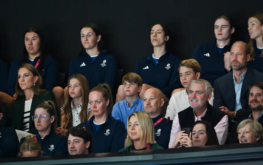 The Prince and Princess of Wales alongside Prince George, Princess Charlotte and Prince Louis, watch a netball match at the Commonwealth Games