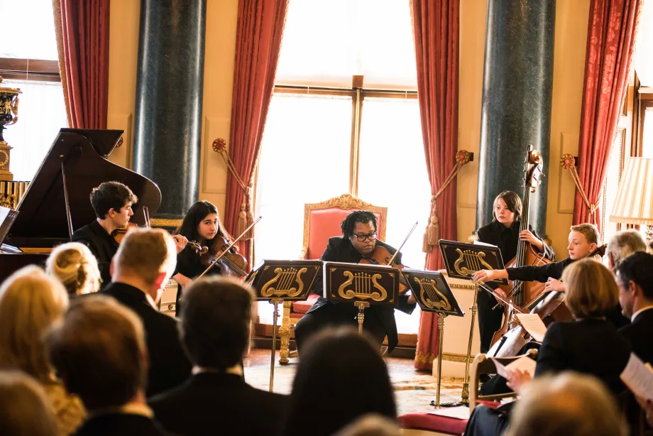 The string quintet performing