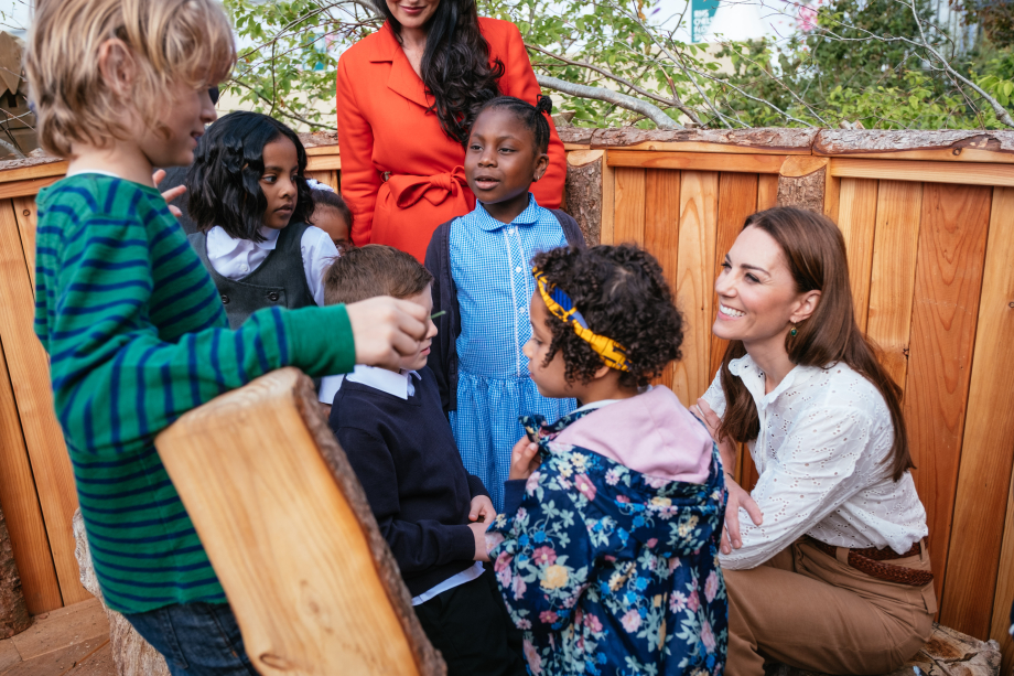 The Duchess of Cambridge and local schoolchildren explore the RHS Back to Nature Garden at the Chelsea Flower Show.