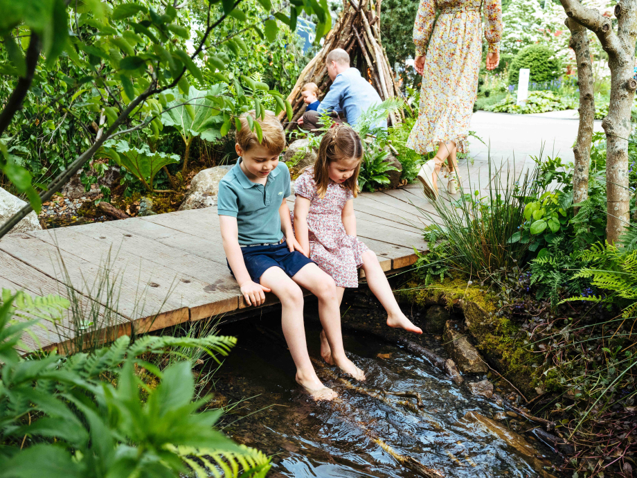 Prince George and Princess Charlotte explore the RHS Chelsea Back to Nature Garden.