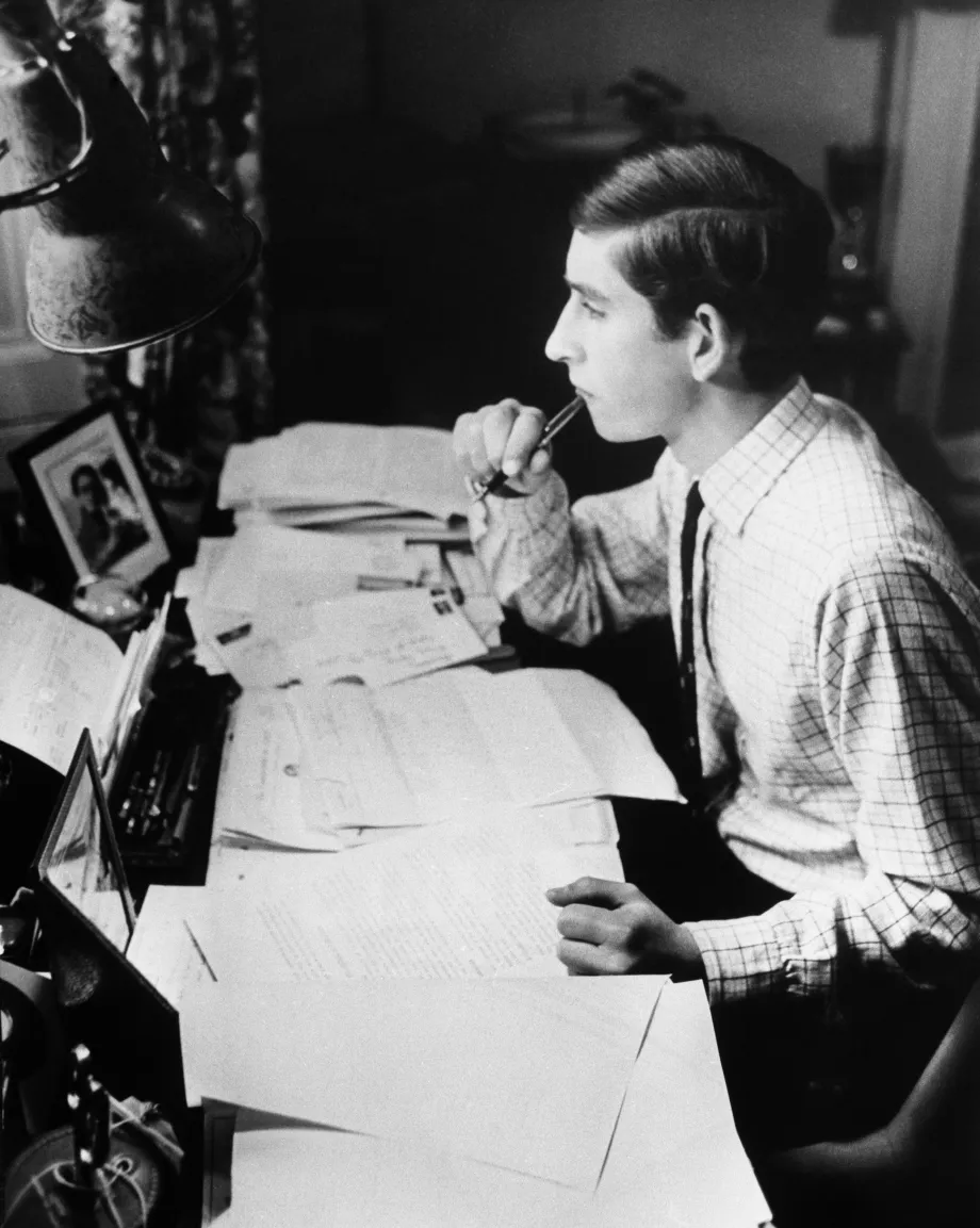 Prince Charles studies in his room at Trinity College Cambridge, 1969.