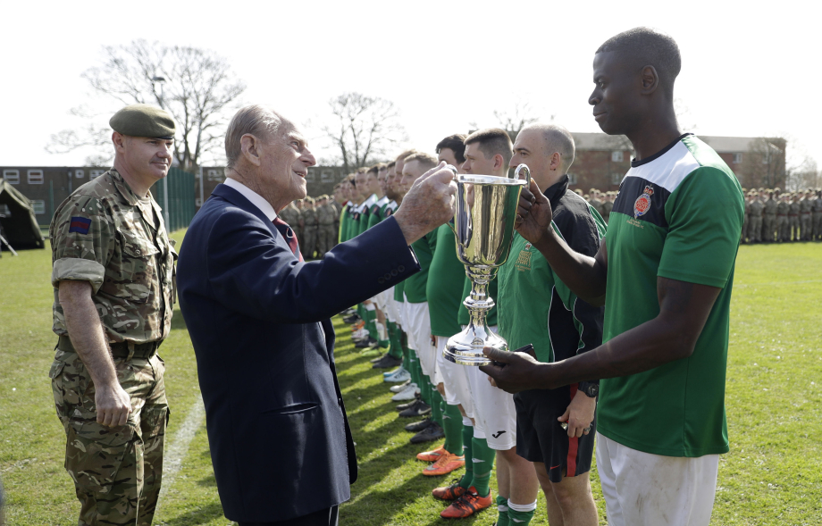 The Duke of Edinburgh presents the Manchester Cup to the Support Company
