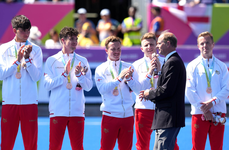 The Earl of Wessex presents the Bronze medal to England
