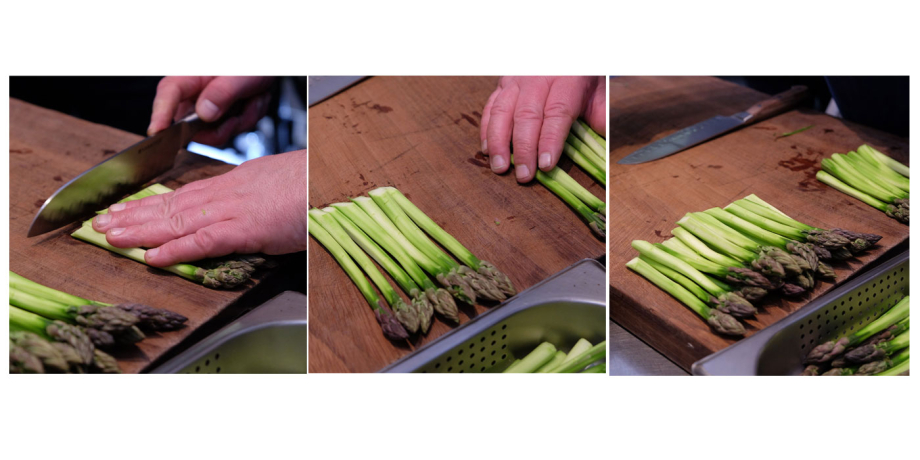 A chef in the Royal Kitchen at Windsor prepares Asparagus 