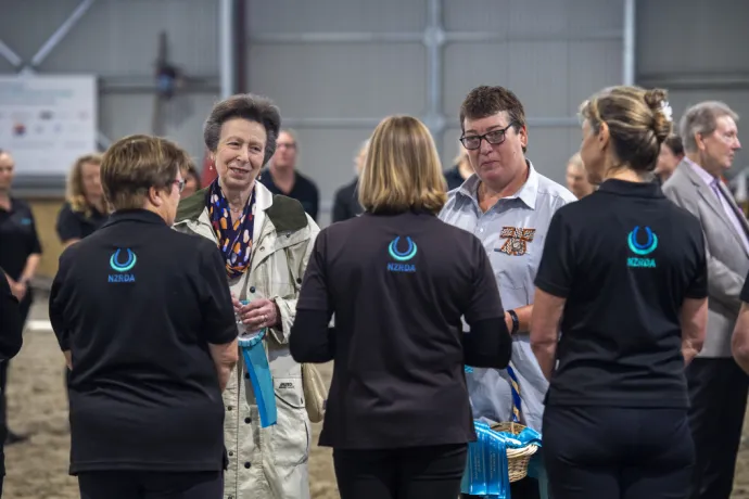 The Princess Royal meets volunteers in an indoor school