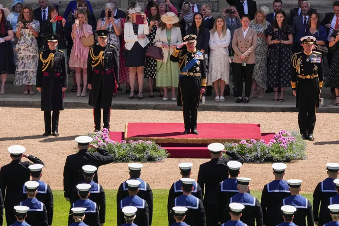 The King presents Royal Navy personnel with RVO medals