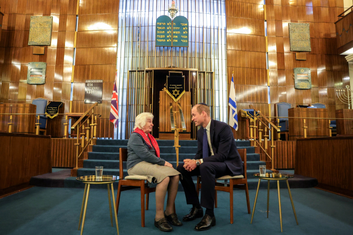 The Prince of Wales meets with a Holocaust survivor at a London Synagogue