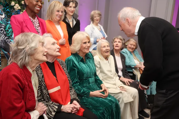 Gyles Brandreth speak to Queen Camilla as whilst posing for a photo with Floella Benjamin, Twiggy Lawson, Harriet Walter, Maureen Lipman (left to right front row) Virginia McKenna, Sian Phillips, Vanessa Redgrave, Penelope Keith and Patricia Routledge at a Celebration of Shakespeare event at Grosvenor House, central London, marking 400 years since the first…
