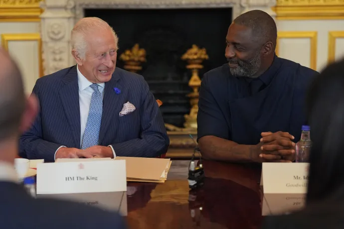 (L-R): His Majesty The King sat next to Idris Elba. Both men are chuckling