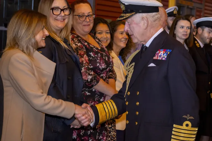 His Majesty The King shaking hands with a member of the public