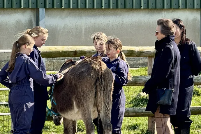 The Princess Royal in conversation with children on the farm
