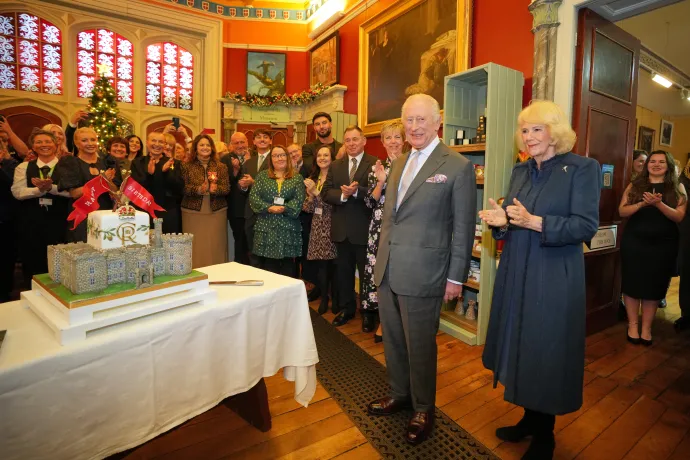 The King and Queen stood alongside His Majesty's birthday cake 